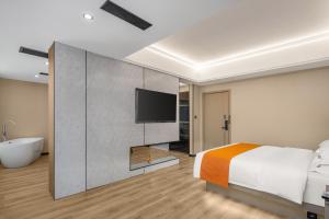 Postel nebo postele na pokoji v ubytování So Easy Hotel