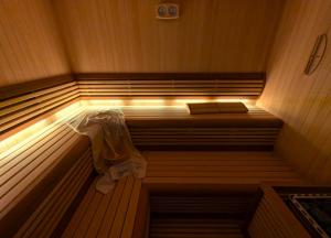 a small sauna with a light in the middle at Pansion Leggero in Krk