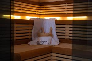 a sauna with towels and aokookookookookookookookooko at Pansion Leggero in Krk