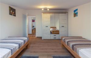 Posteľ alebo postele v izbe v ubytovaní Three-Bedroom Holiday Home In Buje