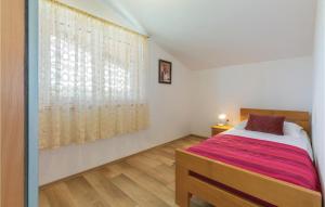 Posteľ alebo postele v izbe v ubytovaní Three-Bedroom Holiday Home In Buje
