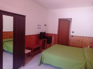 Letto o letti in una camera di Albergo Brioschi