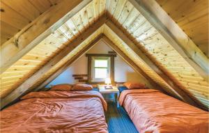 Postel nebo postele na pokoji v ubytování Studio Holiday Home In Bratina