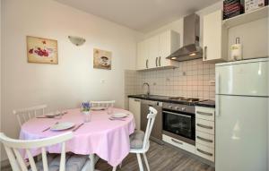 Kuchyň nebo kuchyňský kout v ubytování Holiday Home Podgora 14