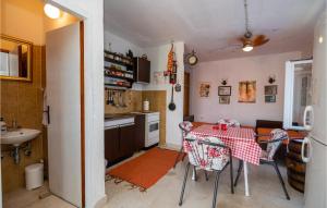 Kuchyň nebo kuchyňský kout v ubytování Holiday Home Podgora 14
