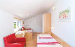 Postel nebo postele na pokoji v ubytování Two-Bedroom Holiday Home In Opuzen