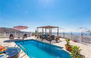 a swimming pool with a view of the ocean at Nice Home In Velilla-Taramay With Wifi in Taramay
