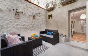 a living room with a couch and a chair at Tiana in Vrsar +15 photos