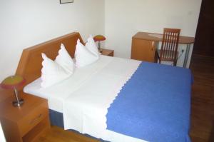 Postel nebo postele na pokoji v ubytování Villa Rosa