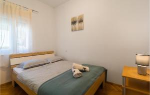Postel nebo postele na pokoji v ubytování Apartment Obala Kralja Tomislava Vi