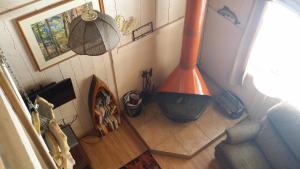 an overhead view of a living room with a stove at Greer Point Trails End Cabins in Greer