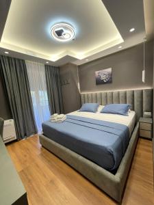 Postel nebo postele na pokoji v ubytování Peaky Hotel