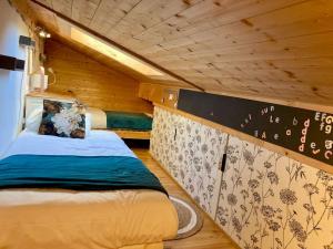 Posteľ alebo postele v izbe v ubytovaní Appartement cosy avec lits faits à l'arrivée
