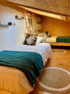 Posteľ alebo postele v izbe v ubytovaní Appartement cosy avec lits faits à l'arrivée