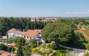 an aerial view of a house with a tree at Casa Bizzarra in Rovinj
