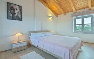 Ένα ή περισσότερα κρεβάτια σε δωμάτιο στο Villa Lenka