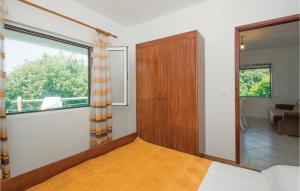 Postel nebo postele na pokoji v ubytování Holiday Home Borova Bb