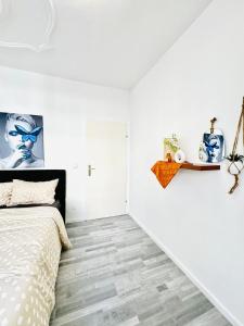 Uma cama ou camas num quarto em Beautiful 4BR Apt for up to 12P 10 Min to FAC Platz