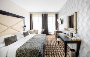 Postel nebo postele na pokoji v ubytování Grandior Hotel Prague