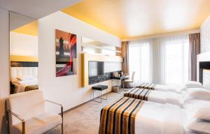 TV a/nebo společenská místnost v ubytování Grandior Hotel Prague