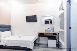 TV a/nebo společenská místnost v ubytování New Kong's Hotel