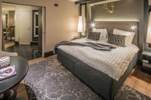 Postel nebo postele na pokoji v ubytování Lapland Hotels Oulu