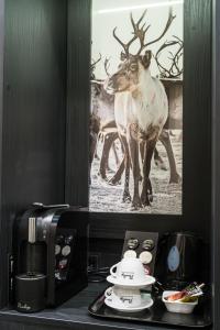 Příslušenství pro přípravu čaje a kávy v ubytování Lapland Hotels Oulu