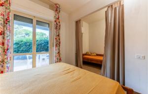 Ένα ή περισσότερα κρεβάτια σε δωμάτιο στο Bilo 5