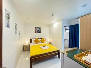 Postel nebo postele na pokoji v ubytování Pupa Rooms