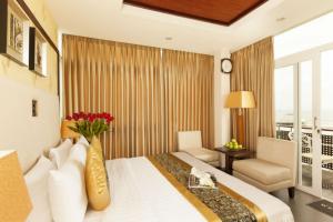 Postel nebo postele na pokoji v ubytování Seaside Resort Vung Tau