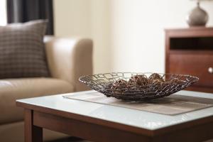 a bowl on a coffee table in a living room at Best Western Hobart in Hobart