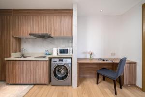 Η κουζίνα ή μικρή κουζίνα στο Hantao AI Select International Apartment