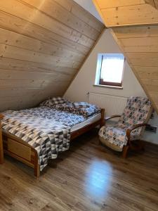 Postel nebo postele na pokoji v ubytování U kowalczyków
