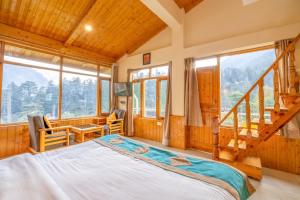 Postel nebo postele na pokoji v ubytování Hide-in Old Manali