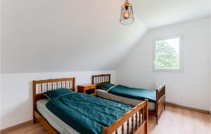 Posteľ alebo postele v izbe v ubytovaní Cozy Home In Lyons-La-Forêt