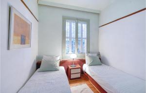 Posteľ alebo postele v izbe v ubytovaní 3 Bedroom Lovely Home In Breda
