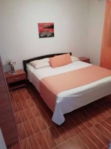 Postel nebo postele na pokoji v ubytování Apartments Marino