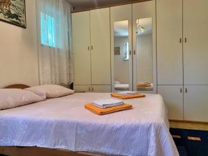 Posteľ alebo postele v izbe v ubytovaní Apartment Gordana