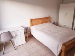 Vue imprenable avec terrasse de 100 m2客房内的一张或多张床位