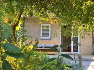 Vonkajšia záhrada v ubytovaní Apartment Gordana