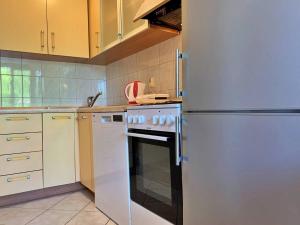 Kuchyňa alebo kuchynka v ubytovaní Apartment Gordana
