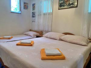 Posteľ alebo postele v izbe v ubytovaní Apartment Gordana