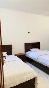 Letto o letti in una camera di villa Sun Wing - Guest House