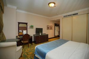 Postel nebo postele na pokoji v ubytování Habitat Hotel All Suites - Jeddah