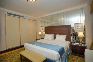 Postel nebo postele na pokoji v ubytování Habitat Hotel All Suites - Jeddah