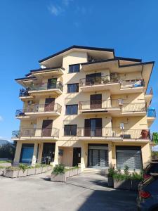 a tall apartment building with balconies on it at Interamna Dreams in Pignataro Interamna