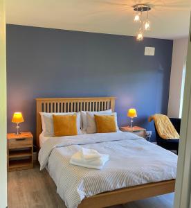 Postel nebo postele na pokoji v ubytování Hazeltree Lodge