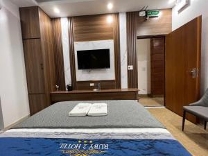 Posteľ alebo postele v izbe v ubytovaní Ruby 2 Hotel