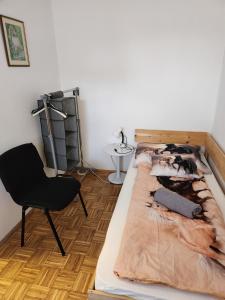 Posteľ alebo postele v izbe v ubytovaní Orsi Szálláshelyek Kecskemét 2