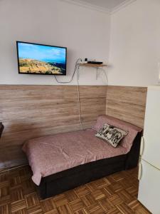 Posteľ alebo postele v izbe v ubytovaní Orsi Szálláshelyek Kecskemét 2